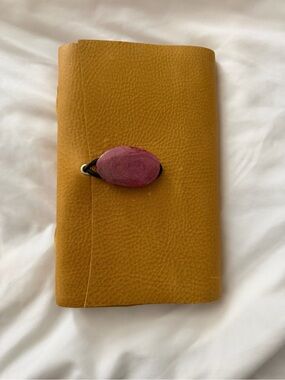 No Boundaries handmade mustard yellow journal with pink stone closure